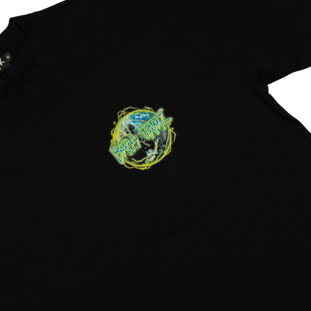 Close-up of the Bass Jamz globe logo chest print on the 2026 Tour Tee. 