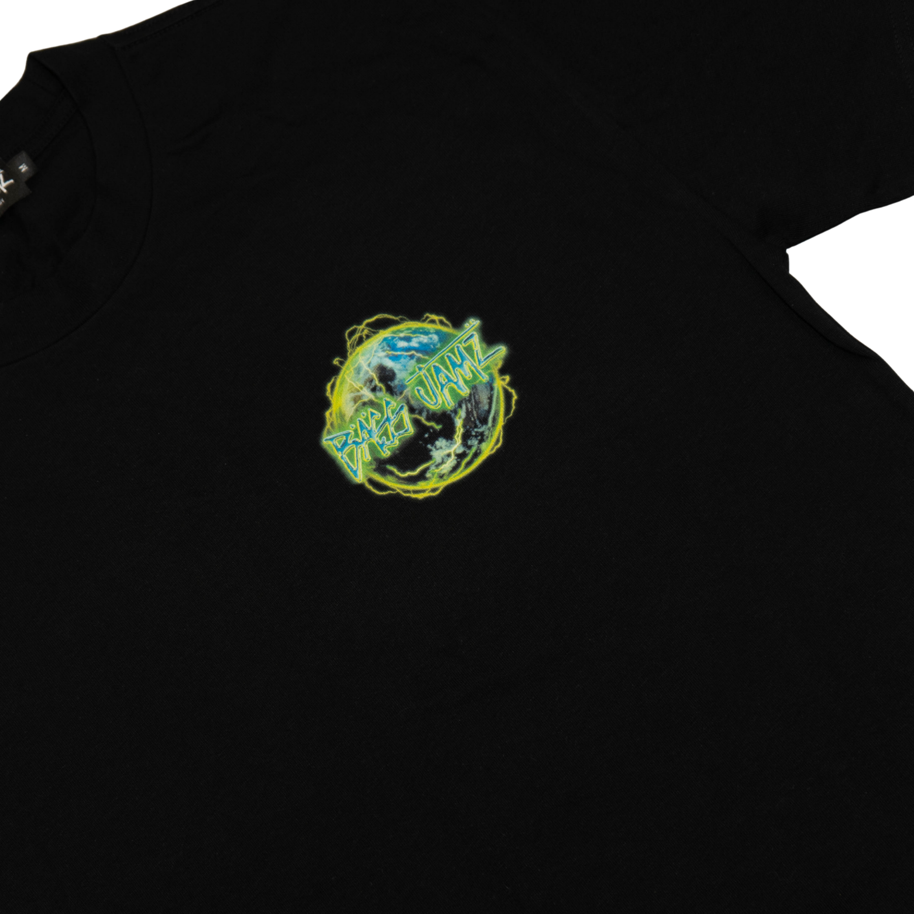 Close-up of the Bass Jamz globe logo chest print on the 2026 Tour Tee. 