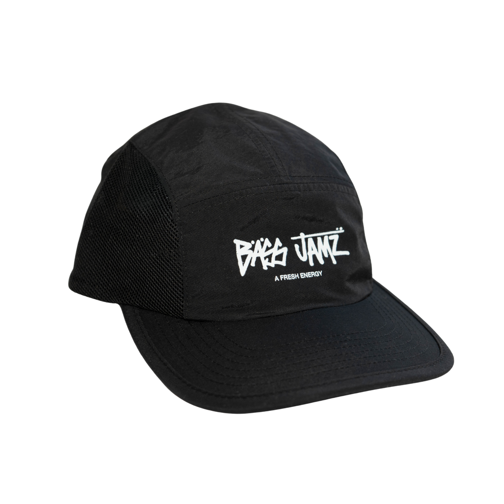 Side angled view of the Bass Jamz OG black nylon cap with printed logo and mesh side panels. 