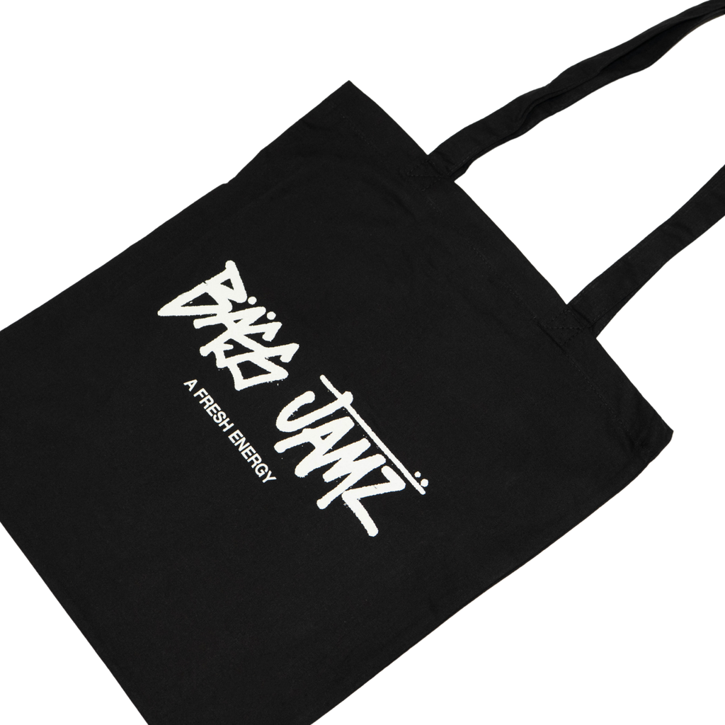 Angled view of the Bass Jamz OG black tote bag featuring the signature graffiti logo.